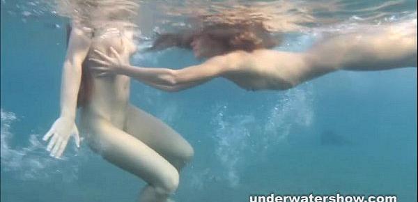  Julia and Masha are swimming nude in the sea